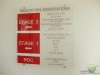 Plaque des associations  cot de l'ascenceur